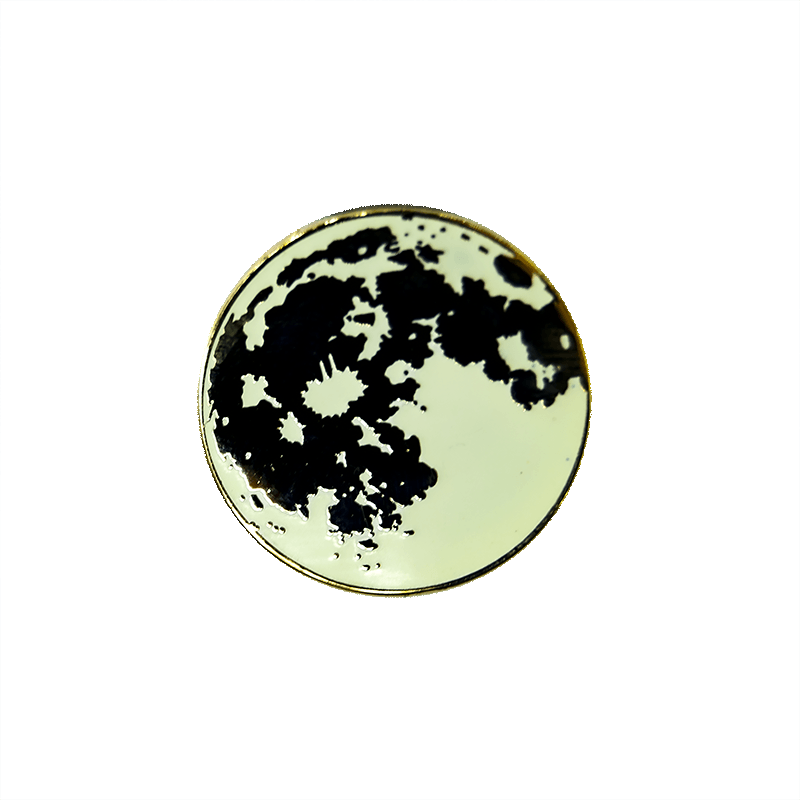 gold plated polished enamel pin of the full moon.